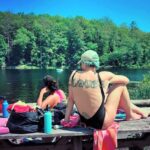 Amanda Palmer Instagram - IT. IS. FINALLY. SUMMER!!! Time for a piano show tonight @gravesidevariety !!! In preparation ? Hanging out with some of my best old old friends and deep in my fave bosoms and deep in the water and feeling like 💃🌊💃🌊🔥 also @stormof69’s yitty was so popular yesterday she came back for a reprise This, my friends, is how I rehearse for a solo show. See many of you tonight for Goodbye Graveside. ♥️🎹🎉🔥👌🌊🎨🫀👯‍♂️❤️‍🩹🎢🧚‍♀️