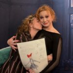 Amanda Palmer Instagram - So many worlds colliding. Musical theater, drag, the @dresdendolls, my kid, fan art, and circular thank you notes. This is 1) me and @thejinkx holding my son Ash’s first fan art, and what an unbelievable full circle moment. Jinkx is a longtime @dresdendolls fan (she was in the old school brigade as a baby theater geek teen in Portland) who exploded to stardom and won Rupaul’s drag race…twice. History just collided when Jinkx played a role in a recent Dr. Who episode as a non-binary evil music-eating monster called “THE MAESTRO” - 3 and 4, can we talk about the LOOK HERE PEOPLE ♥️♥️♥️ - and Ash was smitten and made…his first fan art. Luckily Jinkx was nearby playing Audrey in an off-broadway run of “Little Shop of Horrors”, so we got to see the show and deliver the art IN PERSON….(plus special treat @jimmycarp as the sadistic dentist, shown here in slide 2, he was BRILLLIANT in the role goddamn). I wept real tears when Jinks sang “Somewhere That’s Green”, and Ash got to deliver his Maestro fan art. I got to have a really good long sushi sitdown with Jinkx and talk about life and art and stage and work and power. I think we have found our people. Does life get better than this? Well, there’s always the rub. Jinks posted this photo to her feed and I was reminded that there are a ton of people out there who have encountered me only via TikTok memes who think I’m a terrible person. Whatever, people. I am so much bigger on the inside. I love this life, these circles, this explosion. Jinkx is heading to reprise her role as Mama Morton in CHICAGO on Broadway in a few days…head that way, please, and cheer extra fucking loud. Saying thank you is important. In every direction. Jinkx put us on the list for the show and the final slide is Ash’s thank you note after seeing Jinkx’s show. Three words. You. Did. Great. HAPPY PRIDE MONTH, fellow theater queers. I see you all and love you. Don’t let the bastards get you down. And give Jinkx a follow. She’s putting the art first and this is a performer of total integrity to follow alllll the way. ♥️🎪🎹💃🌈💖🏳️‍🌈🏳️‍⚧️💚🎭