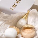Amanda Rigby Instagram - Dior's new J'adore shimmering body gel and scrub are truly an irresistable appeal to the pleasures of bodycare, infused with 24 carat gold particles and Jasmine extract to exfoliate, soften and shimmer your skin, providing it with comfort and glow. With a touch of J'adore Parfum D'eau you will get a long lasting scent with a natural feel. #JadoreDior #CestCaQueJadore @diorbeauty @diorbeautylovers