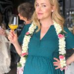 Amanda Schull Instagram – This photo was taken about 1 month before my life forever changed. 
I was excited as well as slightly daunted. I partnered with @gugu_guru to help me figure out what I needed in preparation for this little person who was about to take over my life and heart. 
I’m sharing this because right now I know a lot of expectant parents are unable to go into brick and mortar shops to test and select products for their babies. Gugu Guru provides a personalized concierge service through which they get to know you, your needs, your budget and taste and recommend products that will fit your lifestyle perfectly. 
I had no idea someone so small required so much stuff! Gugu Guru reduced my stress, saved me time, and helped me navigate the overwhelming world of all things baby to figure out what I needed on my registry and in my new life. 
If you want guidance determining what you need and what you don’t, please use code AMANDAS20 for 20% off a Concierge Care or Expert Care package with @gugu_guru .
Ps. Don’t @ me. It’s plain orange juice in a fancy glass. •
•
•📸: @anniemcelwain 
#nofilter #fbf #babyonboard #35weekspregnant #notanad