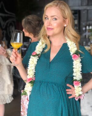 Amanda Schull Instagram - This photo was taken about 1 month before my life forever changed. 
I was excited as well as slightly daunted. I partnered with @gugu_guru to help me figure out what I needed in preparation for this little person who was about to take over my life and heart. 
I’m sharing this because right now I know a lot of expectant parents are unable to go into brick and mortar shops to test and select products for their babies. Gugu Guru provides a personalized concierge service through which they get to know you, your needs, your budget and taste and recommend products that will fit your lifestyle perfectly. 
I had no idea someone so small required so much stuff! Gugu Guru reduced my stress, saved me time, and helped me navigate the overwhelming world of all things baby to figure out what I needed on my registry and in my new life. 
If you want guidance determining what you need and what you don’t, please use code AMANDAS20 for 20% off a Concierge Care or Expert Care package with @gugu_guru .
Ps. Don’t @ me. It’s plain orange juice in a fancy glass. •
•
•📸: @anniemcelwain 
#nofilter #fbf #babyonboard #35weekspregnant #notanad