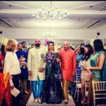 Amber Rose Revah Instagram – @bibilondonstudio dresses @bundlemaclarenmillinery milinary 💛 #family #friends @gracechencouture @manojmakwanadesigns dress @stuartweitzman heels