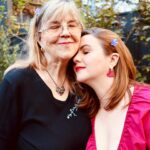Amber Tamblyn Instagram - "I grew up in Southern California in an apartment building complex where I’d often spend evenings around a communal bonfire listening to my father, the artist, and acrobatic dancer, Russ Tamblyn, tell stories about the heydays of Hollywood. My dad starred in everything from the original West Side Story, to David Lynch’s Twin Peaks, rubbed elbows with the likes of Fred Astaire and Henry Miller, and is a beloved culture icon of sorts. You could hear a pin drop - or just the sounds of the crackling fire and my father’s voice - as neighbors and friends alike leaned in to listen closely to his stories of the adventures from his youth. There was the time he received his best friend, the actor Dennis Hopper, in bad shape over the border of Mexico in an ambulance. Or the time he picked up a strange hitchhiker who turned out to be Charles Manson, and his harem of women in Topanga. Or the time he helped Elvis Presley with some dance moves for “Jailhouse Rock.” Or the time his other best friend, the songwriter Neil Young, wrote one of his most famous songs in the backseat of dad’s car on a road trip. Or the time dad turned down that lead role in “Gilligan’s Island.” Or the second time he met the Queen of England. Those stories are just a fraction of his life, and what he writes about in his new memoir, Dancing on the Edge: A Journey of Living, Loving, and Tumbling Through Hollywood. At 89 years old, I like to think it’s a pretty amazing feat, to have come this far, literally and professionally; to have lived for so long, and so hard, and so good, as my dad has, and get to publish a book about it—his first book!— in his golden years. May we all be so fortunate. (Especially the living part.) For The Bare Magazine, I sat down with my dad in my backyard in Brooklyn, New York during his recent press tour for the book to talk about some of his favorite memories from growing up in Hollywood, thinking about life’s biggest regrets at the end of the road, and of course, the essential products he can’t live without (spoiler alert: one of them is a cologne he has worn since I was born, and still wears to this day.)" -- @amberrosetamblyn @officialrusstamblyn ♥️ #linkinbio