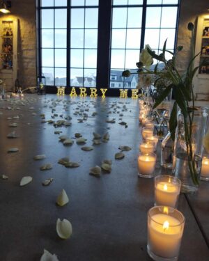 Amberley Snyder Instagram - 💍…. the details…. ✨

Started with a re-creation of our date to Christmas lights, through our adventures at Supercross, Disney, New Orleans, Corvette cruises and NFR just to name a few! Candles, flowers, lights and petals…You didn’t miss a detail for me 🥰 

#amberleysnyder #theclevelands