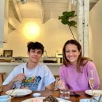 Amy Acker Instagram – I loved getting to take a cooking class with @jackson.carpinello on our trip. The studio was a home kitchen located in the residential area and it was such  a special experience to get the feel of Korean home cooking using the seasonal local ingredients. We also had the opportunity to taste Korean traditional spirits (Makgeolli and Soju) We ate the food we made together and it was a delicious lunch! If you are in Korea definitely take a class at Yiyeoro Studio. Hojung, the instructor and owner of Yiyeoro Studio is the sweetest and such a great teacher! @yiyeoro_studio 💕#visitkorea #imagineyourkorea