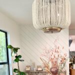 Amy Davidson Instagram - Excited to share our dining room upgrade! ✨ Found the perfect chandelier from @jamieyoungco that adds a touch of elegance and ambiance to our space, and truly brightens up our mealtimes!💡I am obsessed with her furniture and decor! Thank you, Jamie for creating such a beautiful piece! Can't wait to host dinner parties under this beauty! #HomeDecor #ChandelierLove #DiningRoomUpgrade 🏡💡