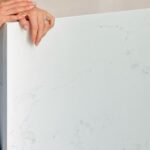 Amy Davidson Instagram - Working with @caesarstoneus for our kitchen countertops was a total dream! Our designer, Cynthia of @sodapopdesigninc loves their stone and when she introduced me, I was instantly sold! We knew we wanted chic, white countertops and when we saw the final design (Cynthia had chosen Empira white) it’s like she had read my mind. 🙌🏻 The waterfall edge!!!! Omigoodness, it’s even more stunning in person! 🤩 The veins in the stone are so unique. Some of them trail off on their own, and other veins clump into their own beautiful designs. CaesarStone slabs truly look like art. ✨ And bonus— they are easy to clean, maintain and are very durable. Thank you Cynthia and CaesarStone for making my dream kitchen come to true❣️🫶🏻❣️