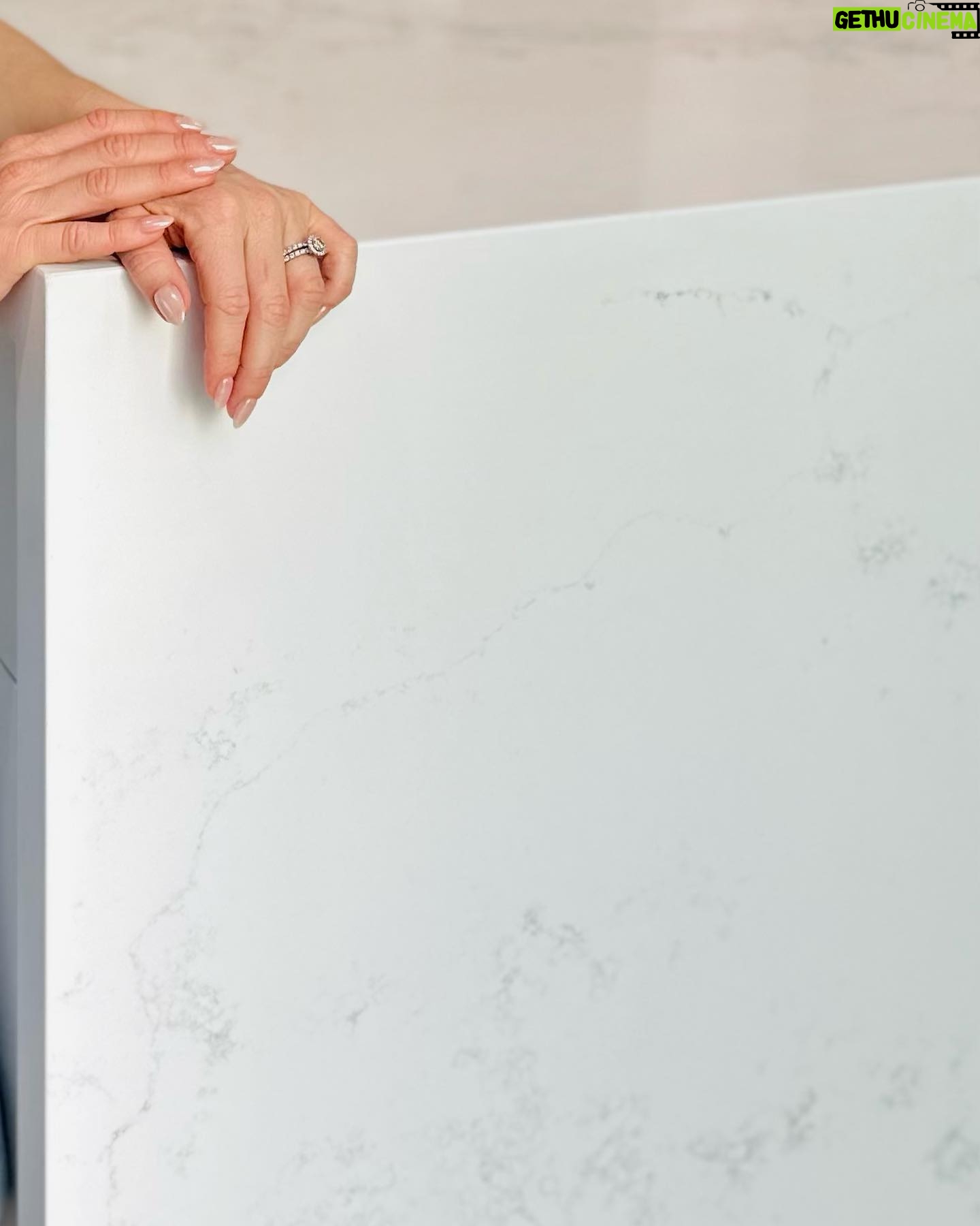 Amy Davidson Instagram - Working with @caesarstoneus for our kitchen countertops was a total dream! Our designer, Cynthia of @sodapopdesigninc loves their stone and when she introduced me, I was instantly sold! We knew we wanted chic, white countertops and when we saw the final design (Cynthia had chosen Empira white) it’s like she had read my mind. 🙌🏻 The waterfall edge!!!! Omigoodness, it’s even more stunning in person! 🤩 The veins in the stone are so unique. Some of them trail off on their own, and other veins clump into their own beautiful designs. CaesarStone slabs truly look like art. ✨ And bonus— they are easy to clean, maintain and are very durable. Thank you Cynthia and CaesarStone for making my dream kitchen come to true❣️🫶🏻❣️