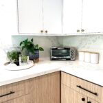 Amy Davidson Instagram - Working with @caesarstoneus for our kitchen countertops was a total dream! Our designer, Cynthia of @sodapopdesigninc loves their stone and when she introduced me, I was instantly sold! We knew we wanted chic, white countertops and when we saw the final design (Cynthia had chosen Empira white) it’s like she had read my mind. 🙌🏻 The waterfall edge!!!! Omigoodness, it’s even more stunning in person! 🤩 The veins in the stone are so unique. Some of them trail off on their own, and other veins clump into their own beautiful designs. CaesarStone slabs truly look like art. ✨ And bonus— they are easy to clean, maintain and are very durable. Thank you Cynthia and CaesarStone for making my dream kitchen come to true❣️🫶🏻❣️