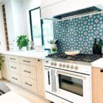 Amy Davidson Instagram - Working with @caesarstoneus for our kitchen countertops was a total dream! Our designer, Cynthia of @sodapopdesigninc loves their stone and when she introduced me, I was instantly sold! We knew we wanted chic, white countertops and when we saw the final design (Cynthia had chosen Empira white) it’s like she had read my mind. 🙌🏻 The waterfall edge!!!! Omigoodness, it’s even more stunning in person! 🤩 The veins in the stone are so unique. Some of them trail off on their own, and other veins clump into their own beautiful designs. CaesarStone slabs truly look like art. ✨ And bonus— they are easy to clean, maintain and are very durable. Thank you Cynthia and CaesarStone for making my dream kitchen come to true❣️🫶🏻❣️
