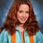 Amy Davidson Instagram - I mean, this is hilarious. I feel like some of these photos actually look like me. And others not at all. 😆High-school in the 90’s! Trivia questions: Did I have red hair in high school?🤔 Did I play basketball or was I on the pom line? Swipe for my hoops shot! ….Annnnd save the best for last! 🤓🤣OMG #aiyearbook #90s #90