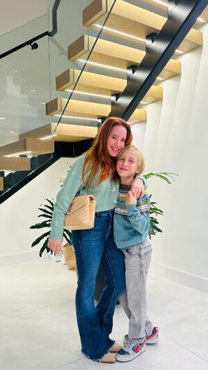 Amy Davidson Instagram - We pulled it off!! Just barely! 😅 While hubby was out of town Len and I had a surprise gift up our sleeves!! There's nothing quite like that feeling of surprising someone and keeping a secret until it's ready. 🤫😝Thank you to those who helped me pull this off! You know who you are 🙌🏻♥️

Two things:
-The sticky stuff on a big bow isn't sticky at all. 
-Clifford could hardly contain himself! He was so excited to see Kacy who had just gotten home and we dragged him straight to his surprise!