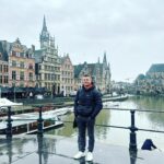Amy Huberman Instagram - Jumped on the train to Ghent from Bruges en route back to Brussels airport with this lovely Ghent-leman What a gorgeous little find! And the city was lovely too 😉 Stunning spot. More like Amsterdam, whereas Bruges is more Gothic dotey cosey cobbled teeny windows vibes (natural travel writer I hear you say?!) #GhentCopeWontCope #happybirthdayBodface