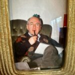 Amy Huberman Instagram - 18 months today without my pal, miss your messing Dad 🩵🩵🩵 This is how I see him so often in my head; the pipe in hand, always drawing and sketching, always taking the piss out of me xxx