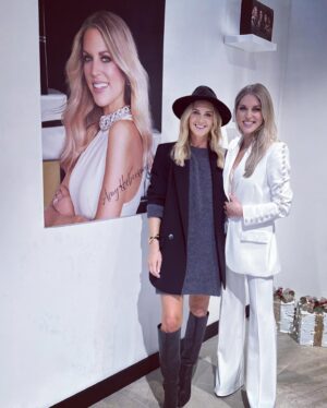 Amy Huberman Instagram - A massive thank you to the brilliant @ayumakeupireland team  for gorgeous launch today. So chuffed to be the face of your Christmas campaign and thank you guys for having me, what a fab Irish brand you have built @suzie.ayu you are a powerhouse 💚☘️ And congratulations on the opening of your brand new sparkling store in Kildare Village ✨
Full sidewise pelting rain with  floor length flares soggy to the knee; the ONLY way to glam up of a morn.
The suit is @nadinemerabi I wore to the book awards last year which I had 💯 percent forgotten to dry clean. I mean what could possibly go wrong with a full white suit?! Jesus. Looked like I might have been dipped, rolled and soaked in a full bath of Guinness. And I don’t even drink Guinness. My local dry cleaners are complete dreamboat magicians.  Thank you for a gorgeous morning @ayumakeupireland you are a indeed gorgeous team #paidpartnership