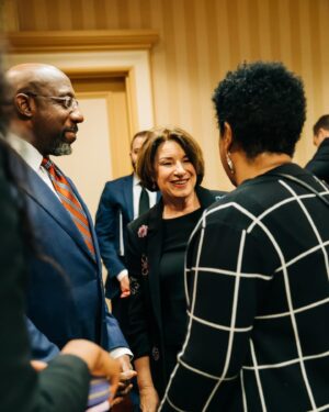 Amy Klobuchar Instagram - How great to have my friend and national leader Georgia Senator @raphaelwarnock at the Humphrey/Mondale dinner!