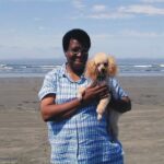 Amy Sherald Instagram - I’m a little obsessed with people and their dogs. This picture of Octavia Butler with her pooch is 🤩. #octaviabutler