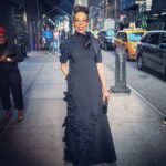 Amy Sherald Instagram - Thank you @gretaconstantine Bag: @jimmychoo 💫#nyc #fashion #flowers #blackdress #secretstylist