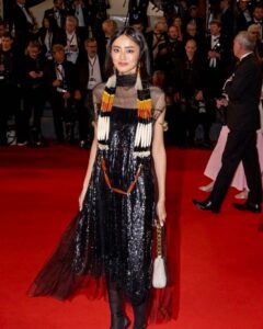 Andrea Kevichusa Instagram - Cannes Film Festival, ‘23. Premiere of May December, directed by Todd Haynes. Honoured and thrilled to have been given the opportunity to represent Nagaland!! Cannes was such a beautiful experience and I am extremely grateful I could attend. @nfdcindia Thank you for the opportunity! Dress: @studiomoonray Styled by @edwardlalrempuia @asulkr