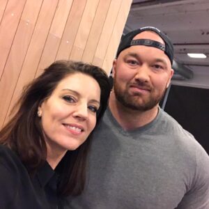 Andrea Parker Instagram - In honor of #tbt and the glorious death of #SerGregor in last week's #Cleganebowl, thought I would share the story of When Andy Met The Mountain!  This literal giant of a man, @ThorBjornsson - who couldn’t have been sweeter or more charming, is the #WorldsStrongestMan irl. I had the pleasure to sit next to him signing autographs during the #ParisManga convention last year and he was a delight.  I’m very tall (6’3” in the shoes I’m wearing here) and look at him tower over me - He explained that to maintain his size and strength he must eat every two hours!  He ate meal after meal, all day long, and when there was a break, he took a nap and his lovely and very petite wife curled up like a kitten on top of him. You can learn more about this amazing man here https://youtu.be/eqpsx9T4MhA  #TheMountain #ThorBjornsson #GOT #paris #bts  #actorslife #gameofthrones