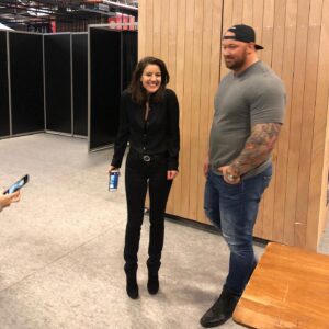 Andrea Parker Instagram - In honor of #tbt and the glorious death of #SerGregor in last week's #Cleganebowl, thought I would share the story of When Andy Met The Mountain!  This literal giant of a man, @ThorBjornsson - who couldn’t have been sweeter or more charming, is the #WorldsStrongestMan irl. I had the pleasure to sit next to him signing autographs during the #ParisManga convention last year and he was a delight.  I’m very tall (6’3” in the shoes I’m wearing here) and look at him tower over me - He explained that to maintain his size and strength he must eat every two hours!  He ate meal after meal, all day long, and when there was a break, he took a nap and his lovely and very petite wife curled up like a kitten on top of him. You can learn more about this amazing man here https://youtu.be/eqpsx9T4MhA  #TheMountain #ThorBjornsson #GOT #paris #bts  #actorslife #gameofthrones