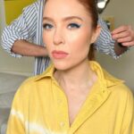 Angela Scanlon Instagram - You often ask about my slap and I was filming yesterday & remembered to get a full list for my fellow “see throughs”…. It’s not my everyday face but if you’re into something a little more “done” or want to try a coloured line (surprisingly low maintenance) save this for later or send it to your redheads 😂 Swipe for a swishy pony by @mauriceflynn & some excellent camera work - @shiseido Synchro Skin Self Refreshing Foundation in “Opal” - @narsissist Creamy concealer in “Chantilly” - @hudabeauty Tantour in “Fair” - @merit Highlighting Balm - Day Glow in “Rose Gold” - @charlottetilbury matte beauty blush wand in “Pillow Talk Peach Pop” - @eylureofficial 2/3 length lashes - Mascara @esteelauderuk Turbo Lash High Powered Volume and Length. - Blue liner @danessamyricksbeauty Colourfix in “Beach” Want more of this….