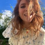 Angela Scanlon Instagram - The Unexpected Red Theory! It’s a thing apparently & sublimely or otherwise it’s been sticky. 1. A shiny red car I dream of and bag with charms 2. @myfrkl Pixelated heart 3. A red den 4. @tonygreen_illustration 🤠 cowboy hat (currently framing with red bobbles) 5. Old sunnies @maxandco (scrunchie @wearetbco ) 6. Dorothy shoes 7. @virginradiouk lift and Latin toes 8. Red fringe 👀 9. Red dots @14_day_manicure @secretspauk 10. Woman with travel blender Is it a thing?!