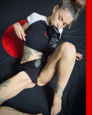 Angie Rae Instagram - You are here. 📍
.

〰️〰️〰️. pupperazzipov . ©️🔍m
.
.
#tattoos #tattooedwomen #inked #inkedgirl #red #howbizarre #omc