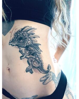 Angie Rae Instagram - ...𝐎nce upon a time there lived a tiny, earthbound luck dragon named Tilly. She protected her human fiercely and cared for her heart lovingly. She did this until her human was strong and safe all on her own. She did this until she couldn’t any longer. Dragons aren’t meant to stay grounded.
Tilly is earthbound no more and lives forever in the skies. ✨✨

@kennydoom gave me the two sickest little fire-breathers a momma could ask for. His B&W is 🔥.

A huge and heartfelt thank you to him and @hopelesstattoo .

🙏🏻🙏🏻🙏🏻
.
.
.
.
.
.
.
.

@suicidegirls #bullysuicide #suicidegirls #altmodel #inkedgirls #maryjane #inked #selfportrait #tattoos @inkedmag