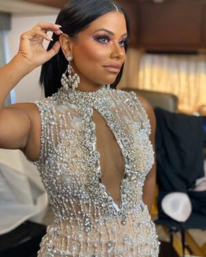Anila Sajja Instagram - My reunion look ⭐️ inspired by 70’s VEGAS GLAM 🎲 it’s giving @cher !! 🎰🔥🔥🔥#casino #70s #vegas #glam #lifesagamble 

Dress custom designed: @bridesbynona 
Jewelry designer: @uniquely_irregular 
Shoe designer: @lesilla 
Hair: @dallaschristopherhair 
MUA: @carolinemakeuptime
Fashion Stylist: @ryanisstyle 
Assist: @isthatjawny 
.
#married2med #married2medicine #m2m #anilasajja #fashioninspo #fashioninfluencer #lookinspo #70svegasglam