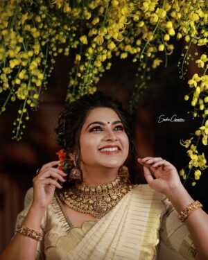Ankhitha Vinod Instagram - 𝐀𝐝𝐯𝐚𝐧𝐜𝐞 𝐇𝐚𝐩𝐩𝐲 𝐕𝐢𝐬𝐡𝐮 💛💖

📸: @sachinchandraphotography
 👗 : @saanshi_handloom_kuthambully 
💄: @zayanas_makeover
💍 : @gem.forher

#picoftheday #postoftheday #traditional  #ketala #vishu #classy #saree #mallugram #keralagram #instagram #instagramam #malayali  #natural #keralasaree  #trending #traditional #outfit #followme #ankhithavinod #makeover #love #keralagram #love #freestyle #instagood #instareels #reels #followankhithavinod