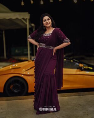 Ankhitha Vinod Instagram - 𝐀𝐥𝐰𝐚𝐲𝐬 𝐏𝐮𝐫𝐩𝐥𝐞 💜✨
.
📽️ : @midhinlal
👗 : @aalaadesigners
💄: @sivas_makeover_
.
#purple #heeriye #sareegown #marriage #dcavanti #reception #actor #celebrity #celebration #celebritywedding #lovemarriage #trending #picoftheday #withthetrend