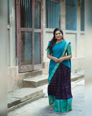 Ankhitha Vinod Instagram - 𝐇𝐨𝐦𝐞𝐥𝐲 𝐄𝐥𝐞𝐠𝐚𝐧𝐜𝐞 🌸✨

📸 : @abhiram_eyebrowman
👗: @ledarla_design_studio
💄: @brides_of_deepthi

#halfsaree #traditional #blues #temple #reels #malayalamactor #photoshoot #instagramreels #actress #goingwiththetrend #transition