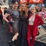 Anna Brisbin Instagram - The Hunger Games: The Ballad of Songbirds and Snakes…. sksksjsjjsjssnbsbd where to BEGINNNNN??!?!?! This premiere was everything. I adored the Hunger Games books and movies and never thought we’d be BACK IN PANEM but as horrendous and bloodthirsty as it is, IT FEELS SO GOOD TO BE BACK. 😂 And this movie is BEAUTIFUL. Watching Coriolanus Snow become who he’s destined to be is FASCINATING I LOVE A VILLAIN ORIGIN STORY. Tom Blyth killed it as Corio, and Dr. Gaul is probably my fav Viola Davis role ever, but I think *everyone* will be even more blown away by RACHEL FREAKIN ZEGLER and her STTTUUNNNINNGGG, INSPIRING, WONDERFUL, TALENTEDBRILLIANTINCREDIBLEAMAZINGSHOWSTOPPINGSPECTACULAR Lucy Gray Baird!! That girl can SING and BREAK YOUR HEART in two seconds flat! 💜🎙️🕊️✨ @tomblyth @violadavis @rachelzegler This story is gripping from beginning to end. Which is impressive because baby she’s LONGGG. I feel like I just watched a whole trilogy in one sitting but I LOVED IT. 😍🕊️🐍✨ Thank you thank you thank you @lionsgate for the invite to the premiere. For dress code you said “Capitol Chic” and I asked myself What Would Cinna Do. 💛✨ Now brb I’m going to binge the original movies IMMEDIATELY. @thehungergames #LionsgatePartner #TheHungerGames #TheBalladOfSongbirdsAndSnakes
