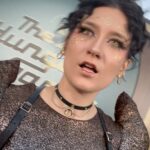 Anna Brisbin Instagram - The Hunger Games: The Ballad of Songbirds and Snakes…. sksksjsjjsjssnbsbd where to BEGINNNNN??!?!?! This premiere was everything. I adored the Hunger Games books and movies and never thought we’d be BACK IN PANEM but as horrendous and bloodthirsty as it is, IT FEELS SO GOOD TO BE BACK. 😂 And this movie is BEAUTIFUL. Watching Coriolanus Snow become who he’s destined to be is FASCINATING I LOVE A VILLAIN ORIGIN STORY. Tom Blyth killed it as Corio, and Dr. Gaul is probably my fav Viola Davis role ever, but I think *everyone* will be even more blown away by RACHEL FREAKIN ZEGLER and her STTTUUNNNINNGGG, INSPIRING, WONDERFUL, TALENTEDBRILLIANTINCREDIBLEAMAZINGSHOWSTOPPINGSPECTACULAR Lucy Gray Baird!! That girl can SING and BREAK YOUR HEART in two seconds flat! 💜🎙️🕊️✨ @tomblyth @violadavis @rachelzegler This story is gripping from beginning to end. Which is impressive because baby she’s LONGGG. I feel like I just watched a whole trilogy in one sitting but I LOVED IT. 😍🕊️🐍✨ Thank you thank you thank you @lionsgate for the invite to the premiere. For dress code you said “Capitol Chic” and I asked myself What Would Cinna Do. 💛✨ Now brb I’m going to binge the original movies IMMEDIATELY. @thehungergames #LionsgatePartner #TheHungerGames #TheBalladOfSongbirdsAndSnakes