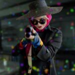 Anna Brisbin Instagram - Run, piggy, run! 💖 I’ve had every piece of this cosplay, including the painted gun, since early 2020. It was so nice to finally put it all on and go be a nerd at WonderCon again. 🥰 photo by @jameschatstv (silly edit by me lol) #harleyquinn #birdsofprey #wondercon #harleyquinncosplay #cosplay