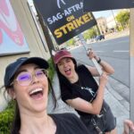 Anna Brisbin Instagram - STRIKE IS OVER! At least, suspended! These past 118 days have been ROUGH but it’s been so inspiring to join forces with my fellow actors for the future of ALL actors. 🥹 Crossing my fingers that the deal our negotiators agreed to is what we needed and that we won’t have to do this again for a longgg longgg time. (Though we’ll see when it comes to videogames shortly… lol) I can finally speak freely about the media I love without worrying about accidentally promoting a struck project and that is SO LIBERATING LMAO so I’m just gonna take this opportunity to tell everyone who loves horror or Edgar Allen Poe to watch Fall of the House of Usher. And I want to give a special shout-out to any non-union influencers who voluntarily chose to stop talking about struck projects in solidarity, often at the cost of your income. 🥹 You didn’t have to do that but it meant so much. It was an honor to picket with you, my union friends. 🤍 #SAGAFTRAstrong #strikeisover and also yes i obviously dressed up for the Barbie Movie. 💖