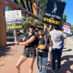 Anna Brisbin Instagram - STRIKE IS OVER! At least, suspended! These past 118 days have been ROUGH but it’s been so inspiring to join forces with my fellow actors for the future of ALL actors. 🥹 Crossing my fingers that the deal our negotiators agreed to is what we needed and that we won’t have to do this again for a longgg longgg time. (Though we’ll see when it comes to videogames shortly… lol) I can finally speak freely about the media I love without worrying about accidentally promoting a struck project and that is SO LIBERATING LMAO so I’m just gonna take this opportunity to tell everyone who loves horror or Edgar Allen Poe to watch Fall of the House of Usher. And I want to give a special shout-out to any non-union influencers who voluntarily chose to stop talking about struck projects in solidarity, often at the cost of your income. 🥹 You didn’t have to do that but it meant so much. It was an honor to picket with you, my union friends. 🤍 #SAGAFTRAstrong #strikeisover and also yes i obviously dressed up for the Barbie Movie. 💖