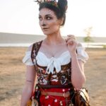 Anna Brisbin Instagram - at ren faire even the parking lot is pretty. ✨ 📷: @jameschatstv bodice: @costureroreal antlers gifted by @helloimlana 🥰 #renfaire #renaissancepleasurefaire #renfest #faun #deermakeup