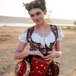 Anna Brisbin Instagram - at ren faire even the parking lot is pretty. ✨ 📷: @jameschatstv bodice: @costureroreal antlers gifted by @helloimlana 🥰 #renfaire #renaissancepleasurefaire #renfest #faun #deermakeup