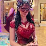 Anna Brisbin Instagram - That’s a wrap on @lojmasquerade 2023. 🥲 Always the most magical night(s) of the year, filled with the best people watching I’ve ever experienced featuring the most creative and wondrous costumes you can imagine. I’m so glad this year I went both nights so I could have my spooky night Friday and my fantastical dragon night Saturday. ❤️‍🔥 🪡corset by master seamstress @nicolerieko 🎭mask by @mischiefmasks 🛡️armor by @syntheticdaisydesign 😈horns by @unicorncorner #labyrinthmasquerade #labyrinthball #dragoncosplay #reddragon #lojmasquerade