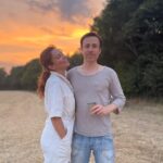 Anna Friel Instagram - Summer time- family time. Me and my brother Michael. He doesn’t do social media. I love him so much. A wonderful doctor and a fabulous father. Sunset ain’t too bad either. #siblinglove ❤️❤️❤️