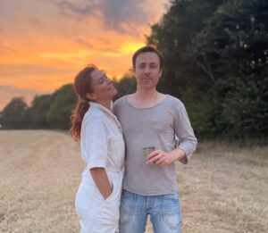 Anna Friel Instagram - Summer time- family time. Me and my brother Michael. He doesn’t do social media. I love him so much. A wonderful doctor and a fabulous father.  Sunset ain’t too bad either. #siblinglove ❤️❤️❤️