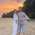 Anna Friel Instagram - Summer time- family time. Me and my brother Michael. He doesn’t do social media. I love him so much. A wonderful doctor and a fabulous father. Sunset ain’t too bad either. #siblinglove ❤️❤️❤️