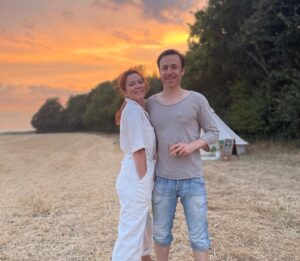 Anna Friel Instagram - Summer time- family time. Me and my brother Michael. He doesn’t do social media. I love him so much. A wonderful doctor and a fabulous father.  Sunset ain’t too bad either. #siblinglove ❤️❤️❤️