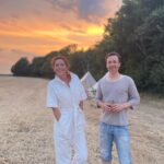 Anna Friel Instagram - Summer time- family time. Me and my brother Michael. He doesn’t do social media. I love him so much. A wonderful doctor and a fabulous father. Sunset ain’t too bad either. #siblinglove ❤️❤️❤️