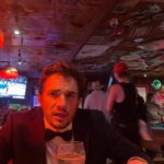 Anna Konkle Instagram - Party built on a dog park, Prada 2019, not now, not vintage, an irrelevant year! Barney’s Beanery loaded with teenagers, I did my own hair 🍝