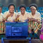 Anna Shaffer Instagram – It’s giving…I’m in actual love with these women! 1986 called and it really said SLEEVES 🤩. Thank you @jjbioh @mons_about @chescmood @jesschase19 for the gift of this role. I can’t believe we are now OPEN, I am so proud of US. This show is unique. It’s so fun and playful and devastating, it shows blackness in all of its complexity and joyfullness. And THE COSTUMES. Come onnnn. Come and see our show! It’s really bonkers and really good! 🎟️ link in bio 🎟️ #SchoolGirlsOrTheAfricanMeanGirlsPlay @lyrichammersmith