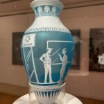 Annabel Crabb Instagram - I went to @ngvmelbourne on Friday to see a specific painting but while I was there in the 18th century wing I stumbled across these incredible creations by Adelaide glass artist @vintagemurtagh … she’s made these ancient Athenian style vessels but when you look closely at the scenes depicted they are of Covid lockdown… Centrelink queues, tired-looking people on their phones wearing masks and queuing up for toilet paper at the checkout … so clever and articulate, also reflecting how ancient the idea of plague is. I then found the artist on here and looked at some of her other stuff - incredible, check it out @vintagemurtagh - and learned that I caught that little two-item exhibit by one day! Jessica it was a delight to stumble across your incredible work. Thanks also to Tiepolo (not on Instagram) whose Cleopatra I was on my way to visit, having recently reread @the_shb_’s GLORIOUS poem about it, which you can swipe to read. Anyway, two artists and a poet 300yrs apart magically conspired to lift my mood when I was feeling tired and anxious so THANK YOU