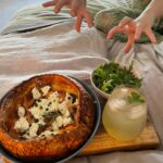 Annabel Crabb Instagram – Breaking: There is now a very satisfying nuclear escalation going on among my children re breakfast in bed. My 17yo, a naturally competitive tyke, learned of yesterday’s fish finger sandwich delivery by her puny sibling and has returned serve blisteringly with this Dutch Baby featuring smoked salmon, whipped cream cheese w capers, cornichon, thyme, lemon zest, green olives and served with a rocket salad and an apple and elderflower spritz on the side. All just ridiculously delicious… all eyes on the 14yo now. And on the 11yo who is away on a sleepover and will shortly return to find her palace of breakfast dominance memorably ransacked OMG. Swipe for further plating photography also the moment last night when – going to bed – I formally acknowledged that the book pile is getting a bit too tottery.